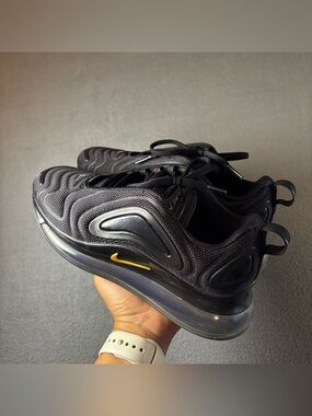 Nike Black Sneakers with Yellow Swoosh Accent